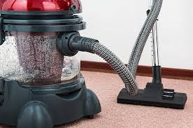 vacuuming carpets